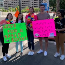 Cheer zone group holding motivating signs
